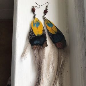 Negative American hand crafted feather earrings